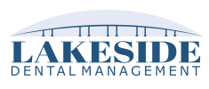 Logo for Lakeside Dental Management, featuring stylized text beneath an abstract arch graphic resembling a bridge against a black background.